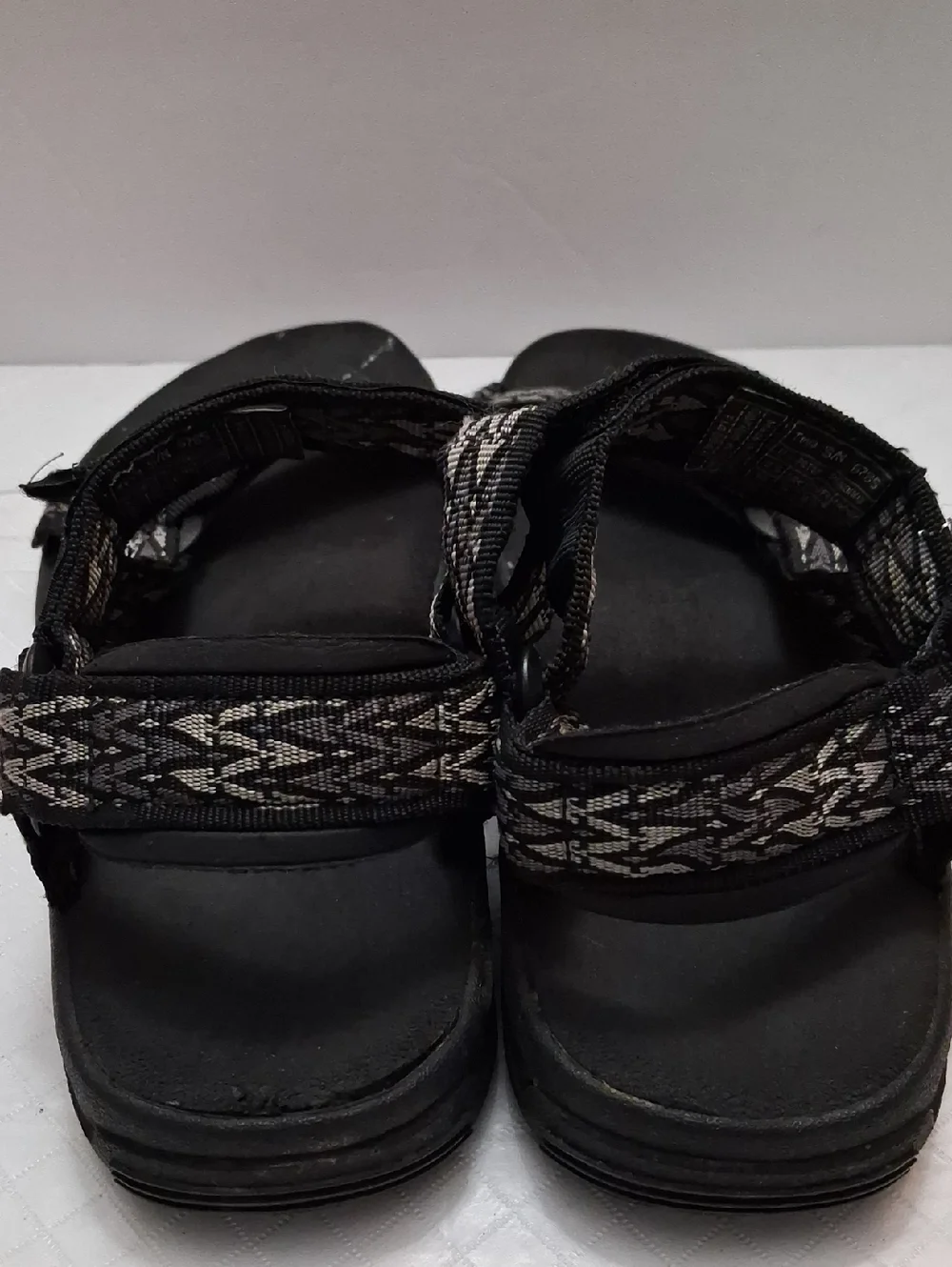 Teva Size 10 men's sandal in black, gray strap with velcro adjustable strap.